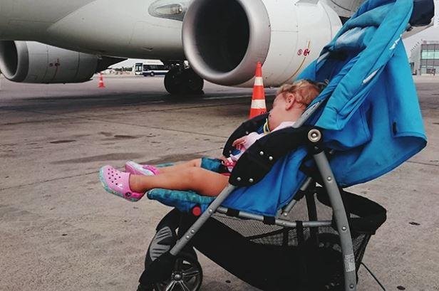 Baby in a stroller at the airport